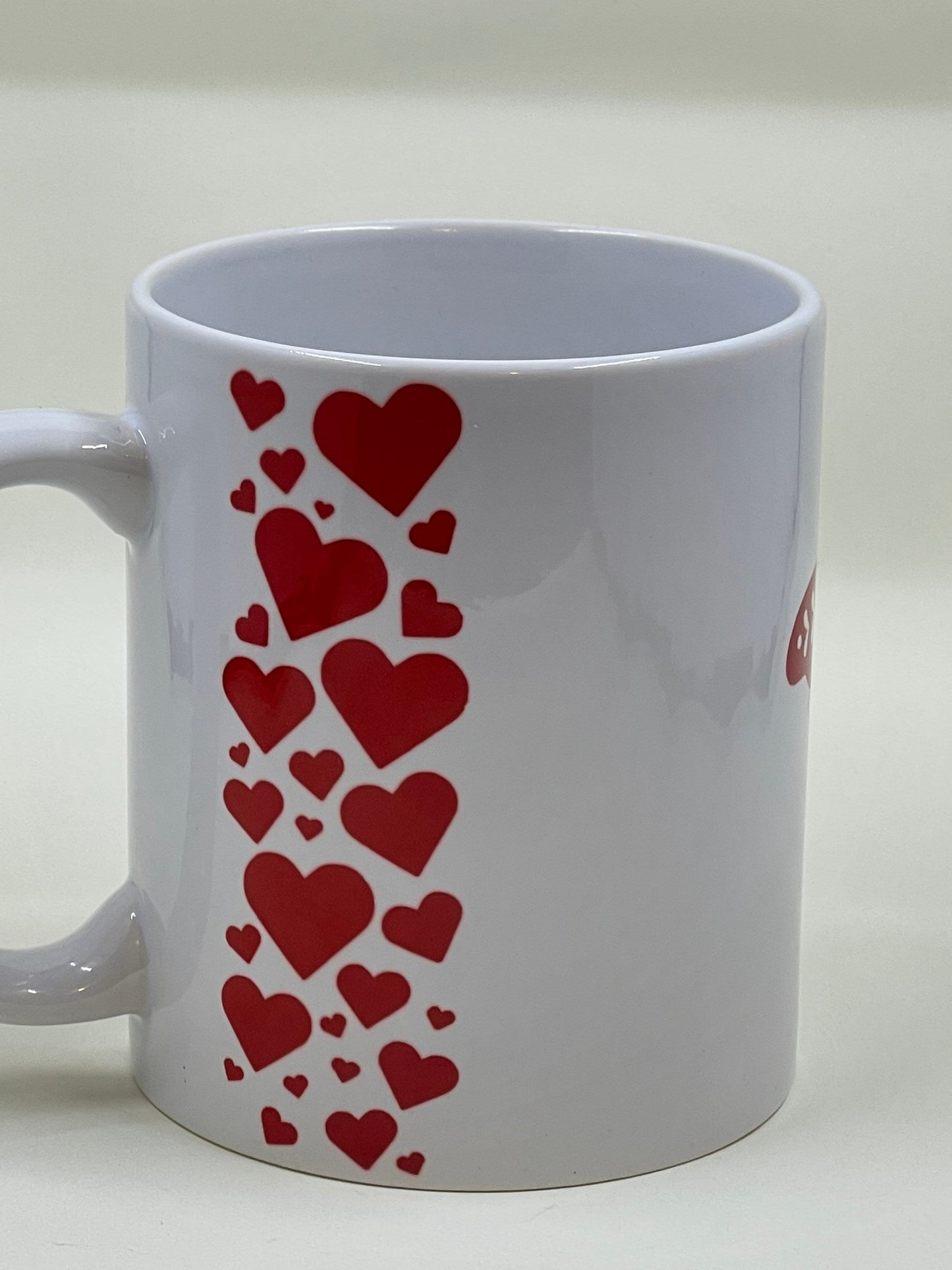 Heart and moth coffee mug