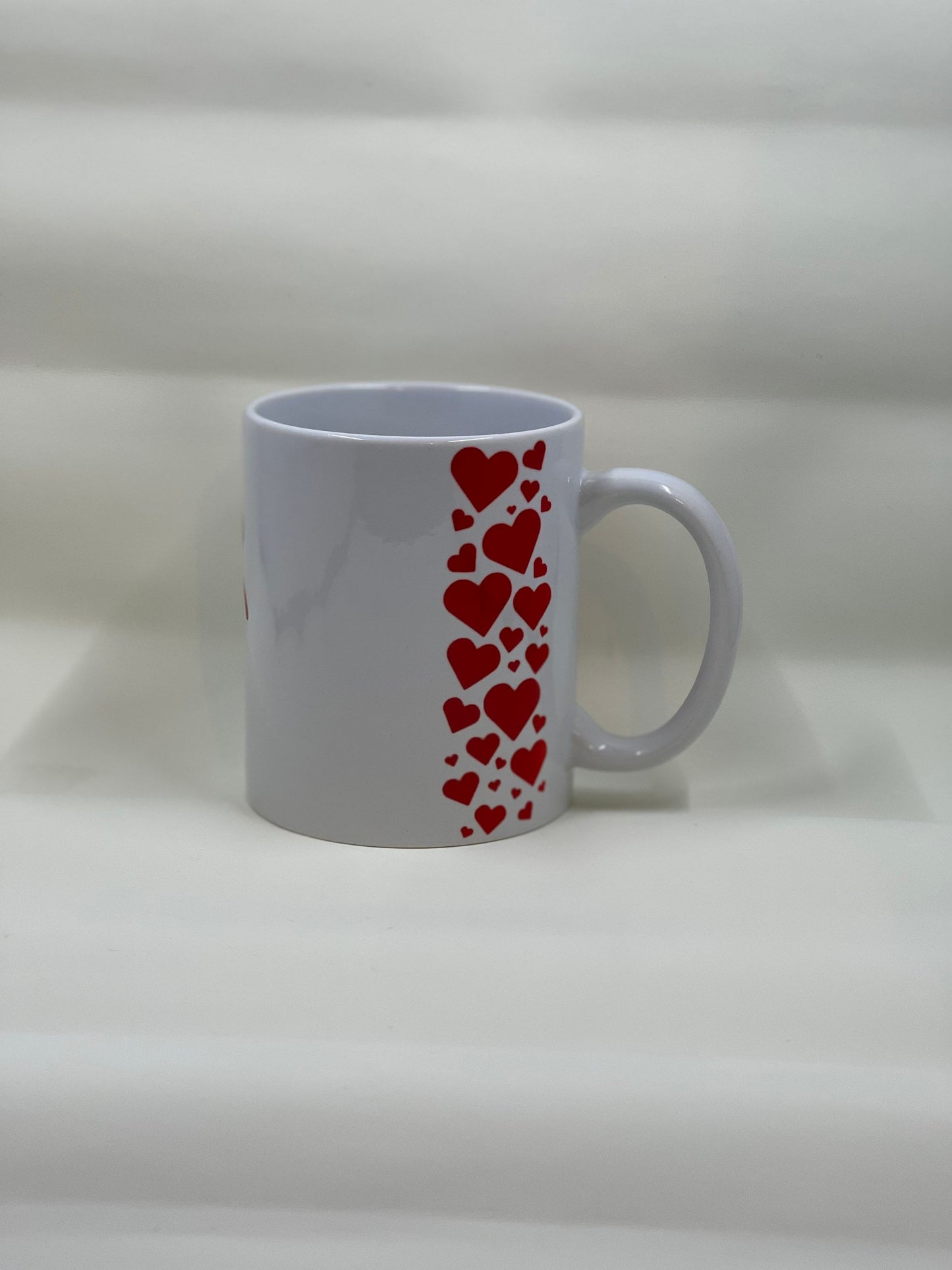 Heart and moth coffee mug